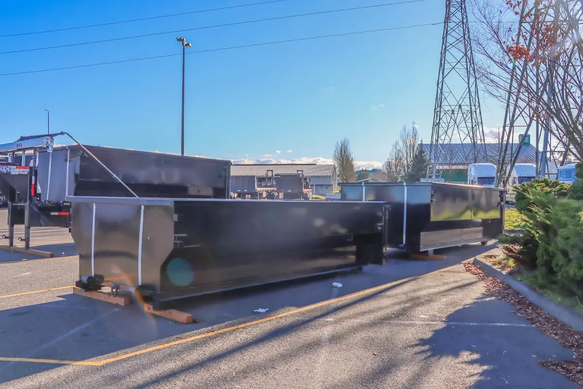 Roll-off dumpster ready for waste disposal at job site for 2 Yard Dumpster Rental in Chatham